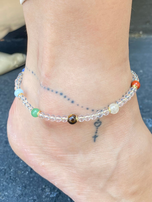 CR Move | Tornozeleira 7 Chakras com Quartzo Cristal – Limpeza Energética e Equilíbrio (Banho Ouro 18K)
