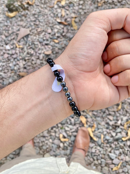 CR Deluxe | Turmalina Negra e Hematita – Proteção, Coragem e Força Pessoal (Banho Ouro 18K)