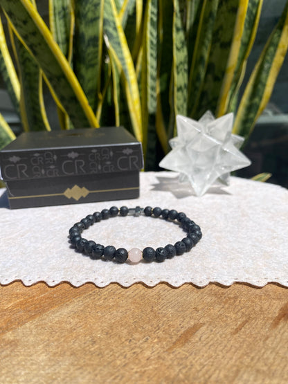 CR Casal | Par Quartzo Rosa e Lava Vulcânica com Cruz de Hematita – Paz, Amor e Proteção (Banho Ouro 18K)