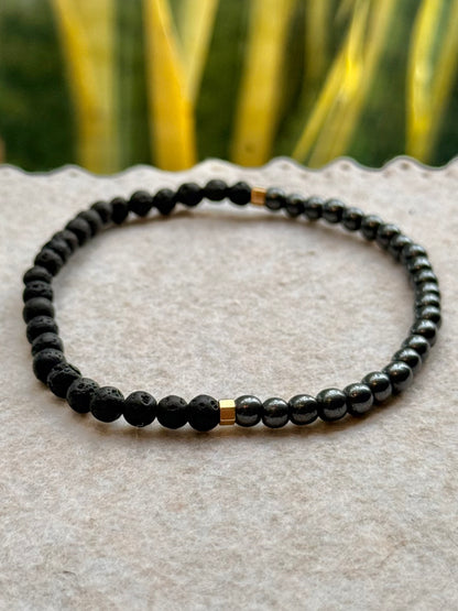 CR Line | Lava Vulcânica e Hematita – Proteção, Vigor e Força Pessoal (Banho Ouro 18K)