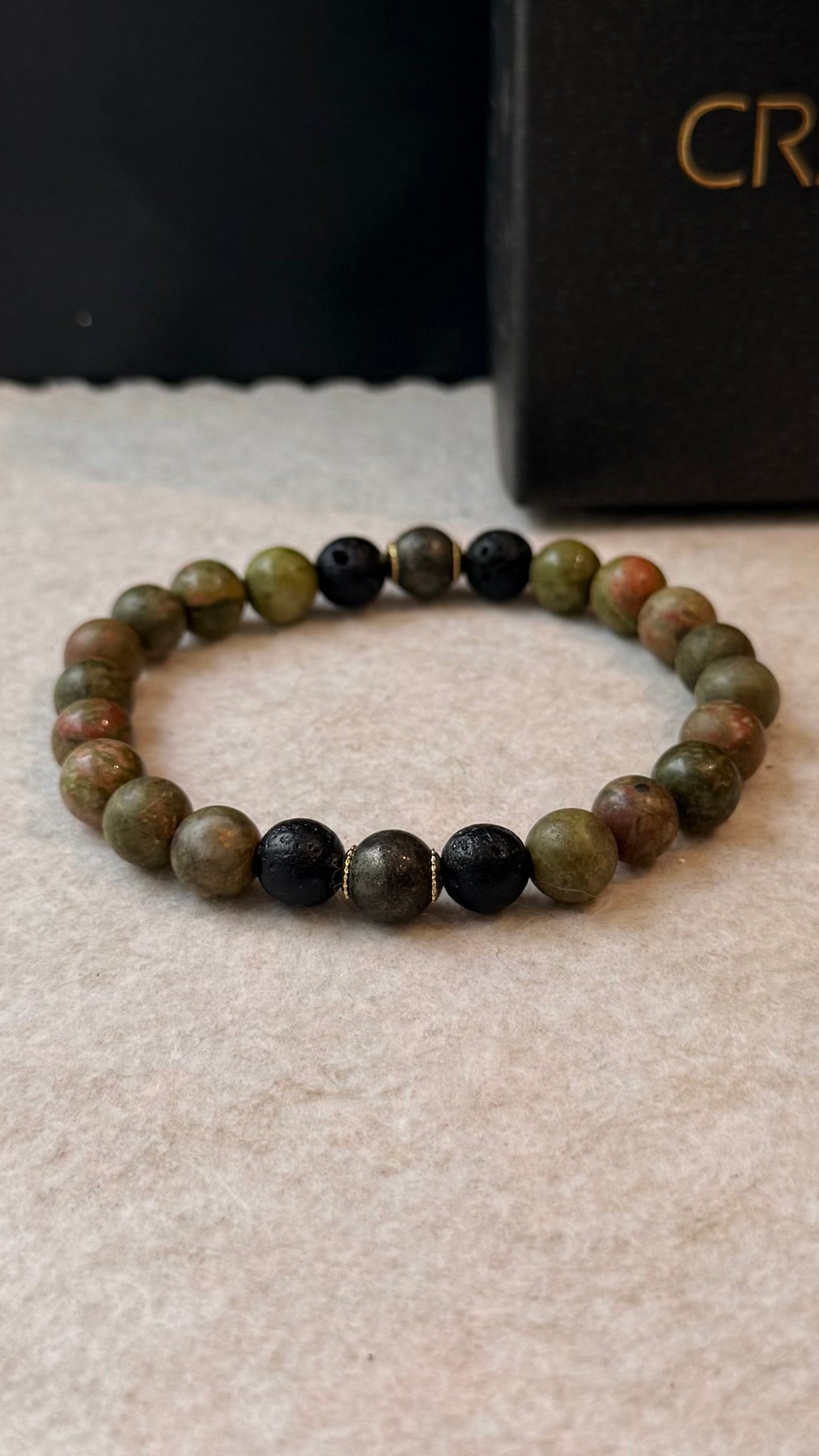 CR Aegis | Unakita, Lava Vulcânica e Pirita – Autoconhecimento, Proteção e Prosperidade (Banho Ouro 18K)