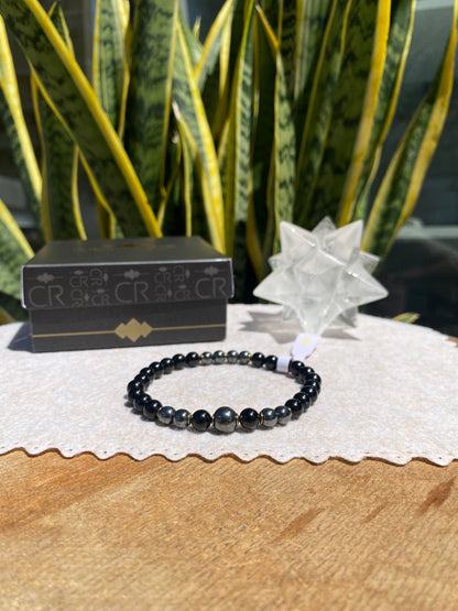 CR Deluxe | Turmalina Negra e Hematita – Proteção, Coragem e Força Pessoal (Banho Ouro 18K)