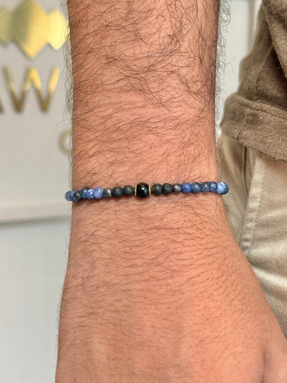 CR Line | Sodalita, Hematita, Lava Vulcânica e Turmalina Negra – Foco, Intuição e Proteção (Banho Ouro 18K)