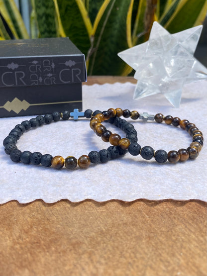 CR Casal | Olho de Tigre e Lava Vulcânica com Cruz de Hematita – Proteção, Afasta Inveja e Mau-Olhado (Banho Ouro 18K)